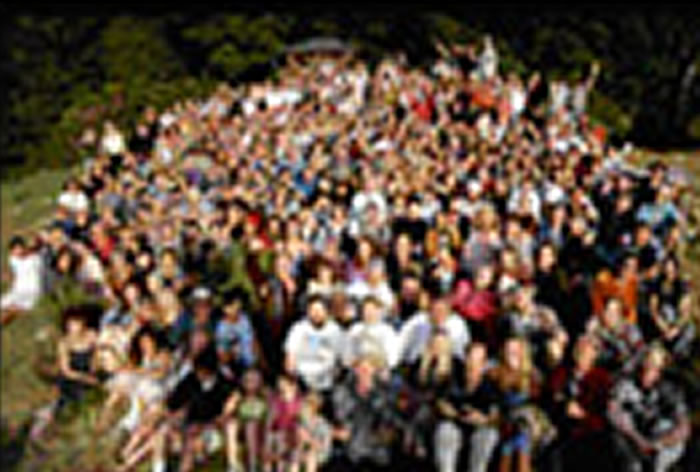 A large gathering of people celebrating together